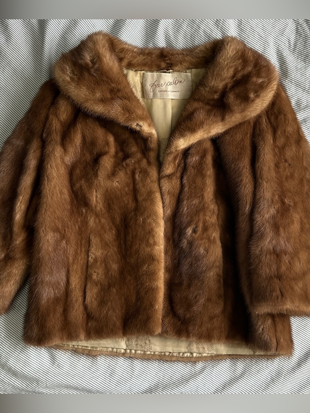 Vintage genuine mink fur coat in a rich brown colour.